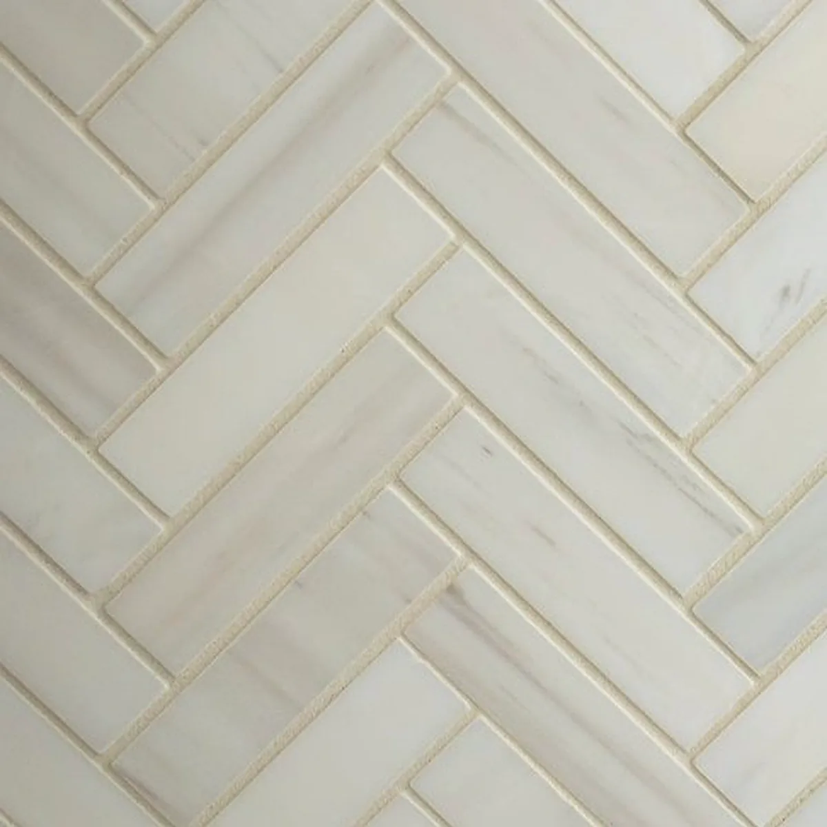 White marble herringbone tile